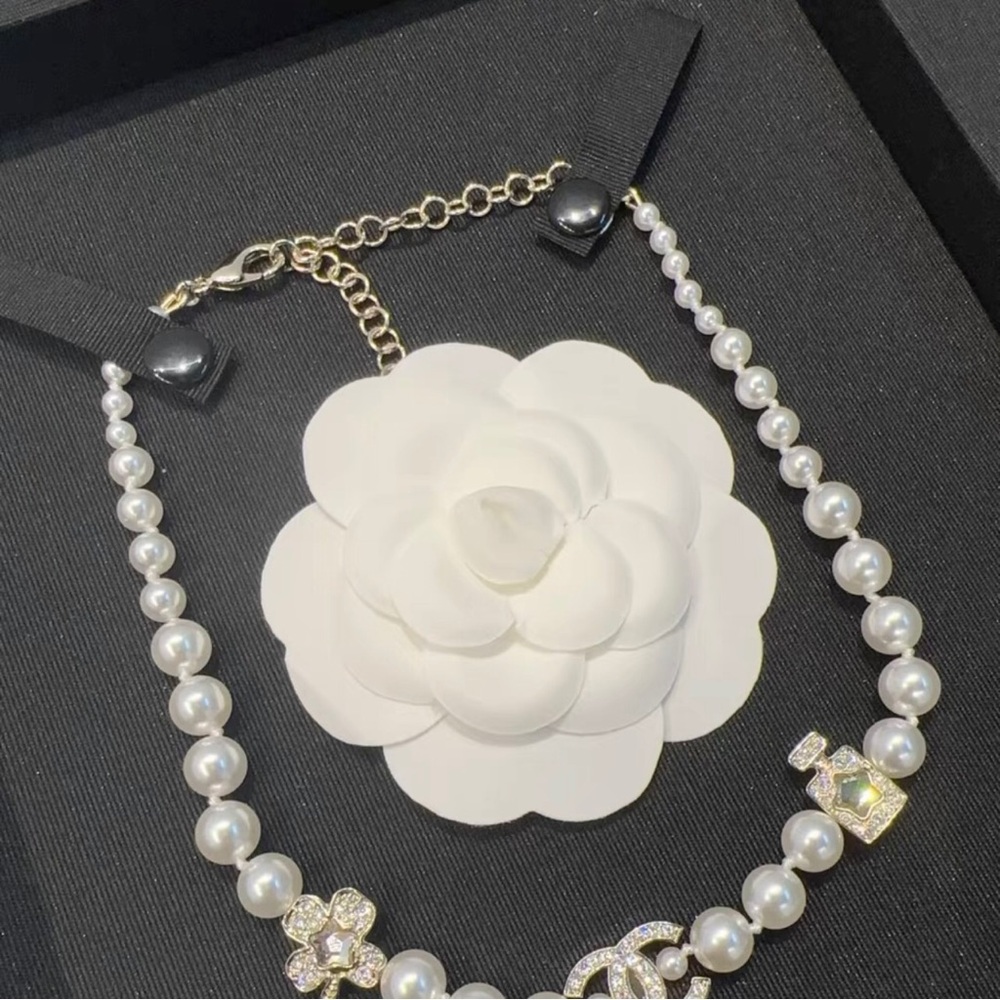 CHANEL Pearl Necklace with Gold Accents